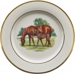 Bluegrass Salad Plate Bluegrass is at once modern and classic. On a pure white porcelain body, Wear presents exquisite images of blue-blooded Thoroughbreds in scenes as lovely as her famous portraits. The graceful renderings are encircled in hand-painted burnished gold bands. Cup handles are finished with hand-painted burnished gold, bringing a polished and quiet elegance to the table.

Please contact store for delivery timing at 859-225-7474 or at sales@lvharkness.com.